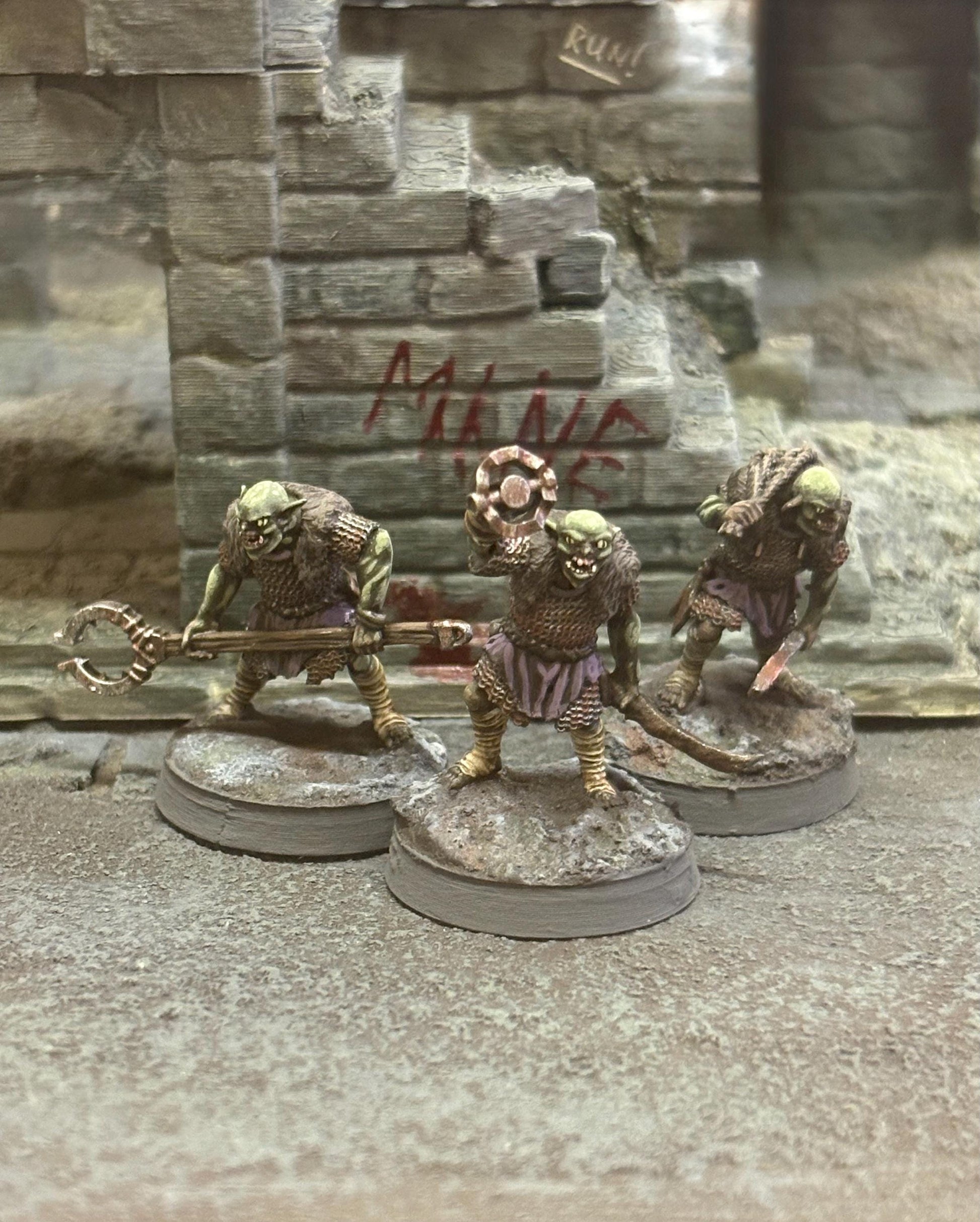 3D printed dark fantasy goblin trappers, stalking through some ruins. Printed in the UK by Ironclad Forge