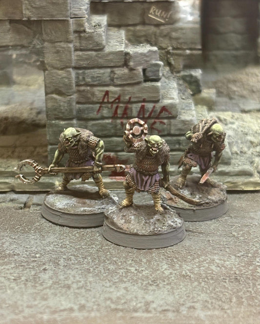 3D printed dark fantasy goblin trappers, stalking through some ruins. Printed in the UK by Ironclad Forge