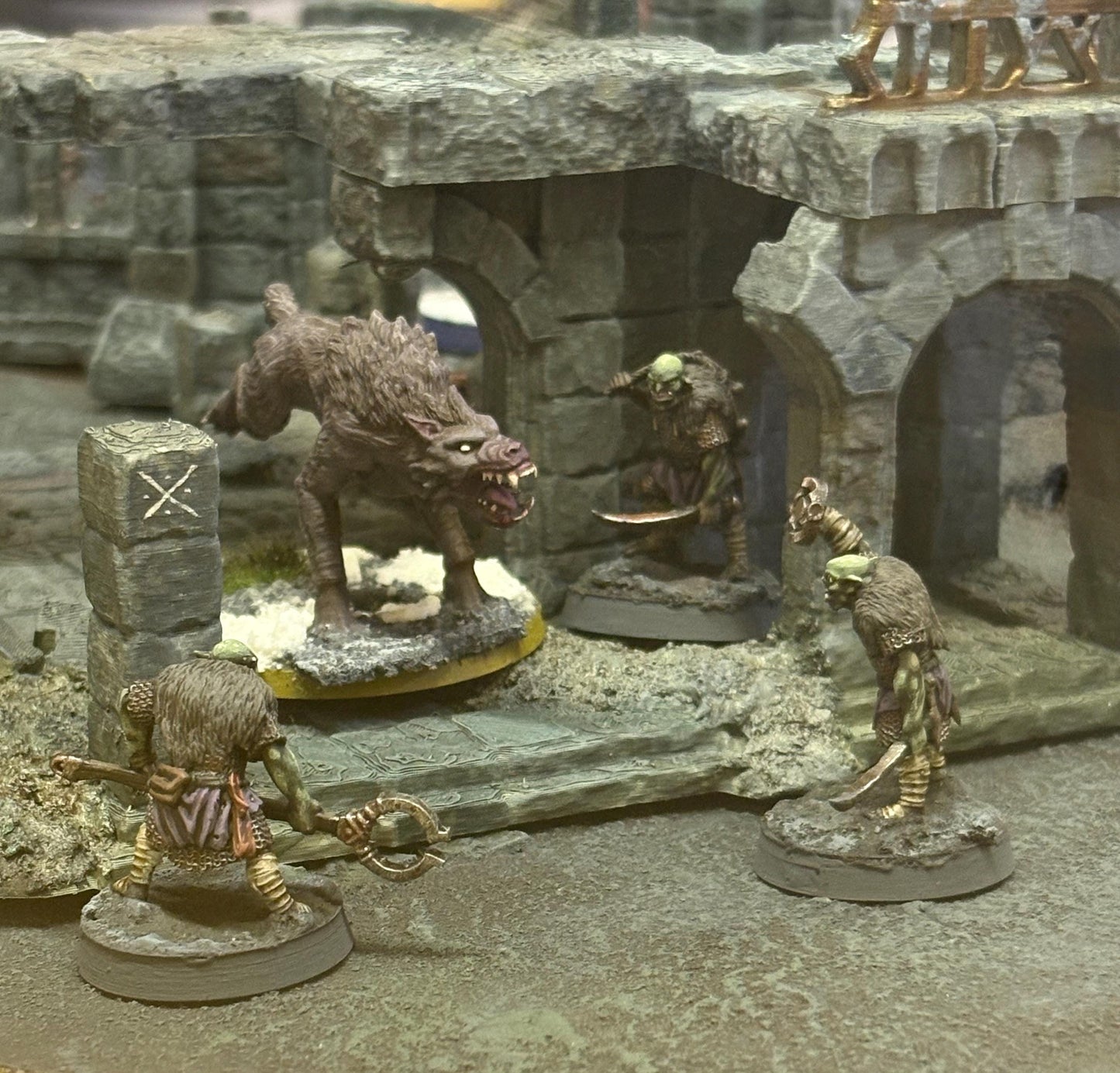 Goblin Trappers ambush a wolf among the ruins, printed in the UK 